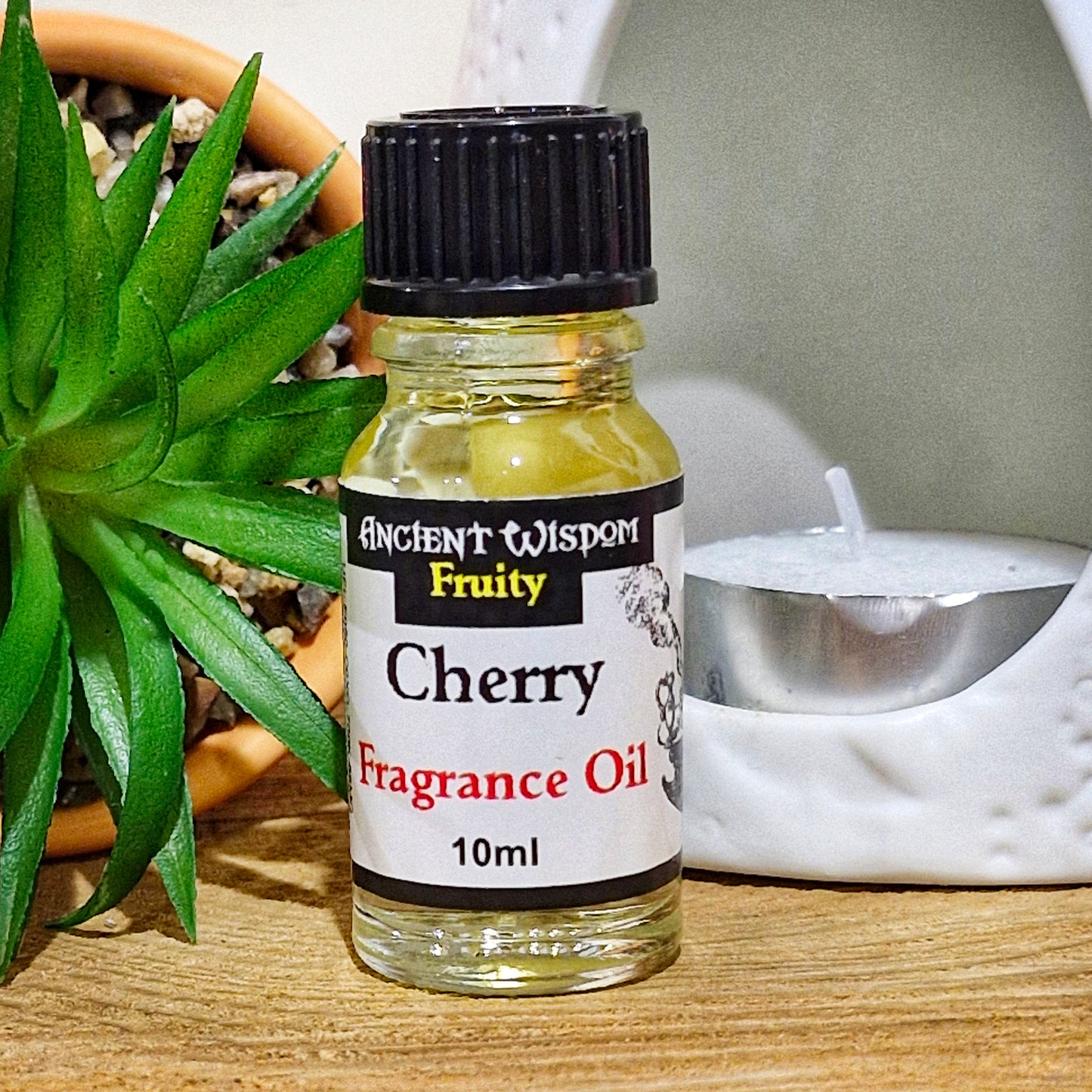 A 10ml bottle of cherry fragrance oil 