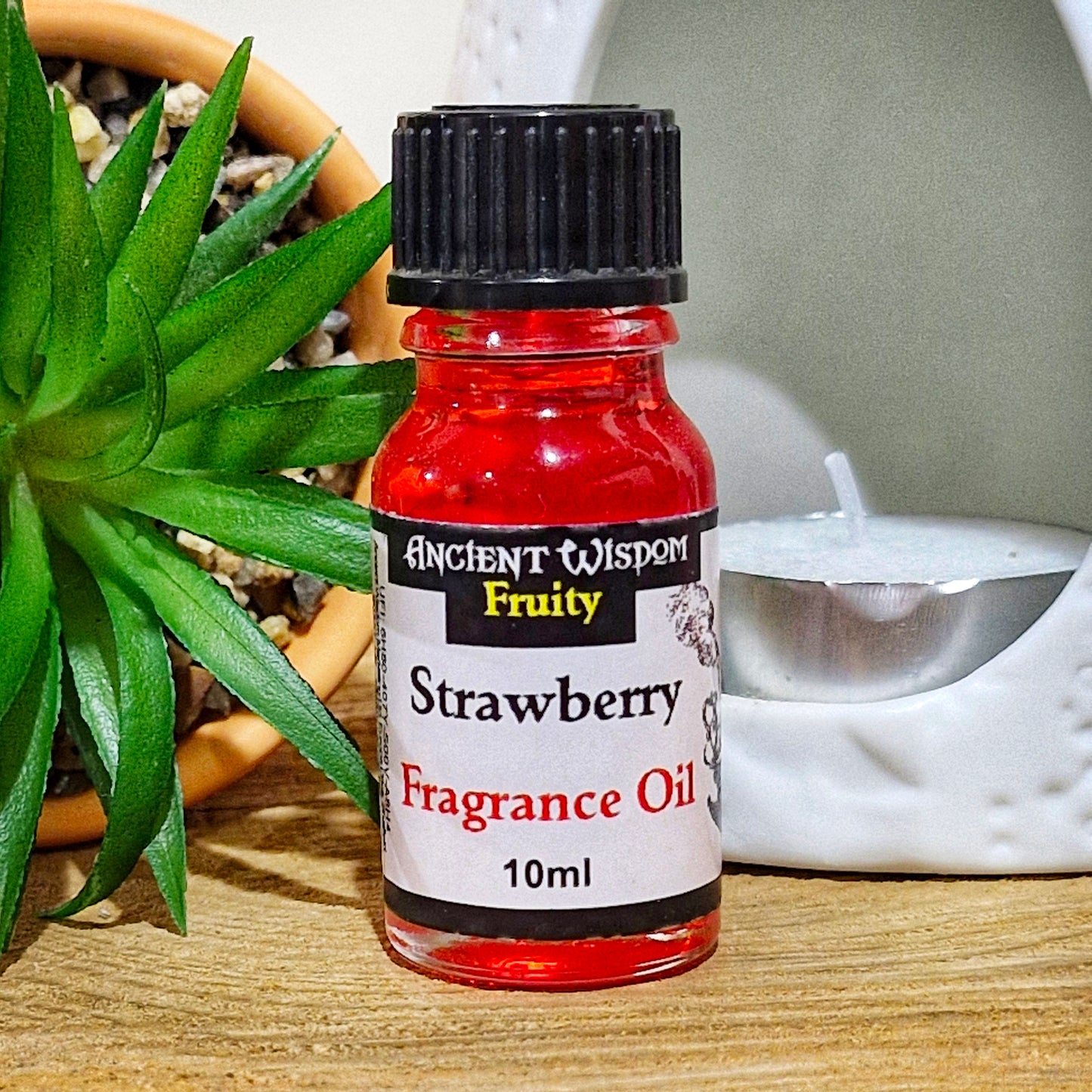 A 10ml bottle of strawberry fragrance oil 